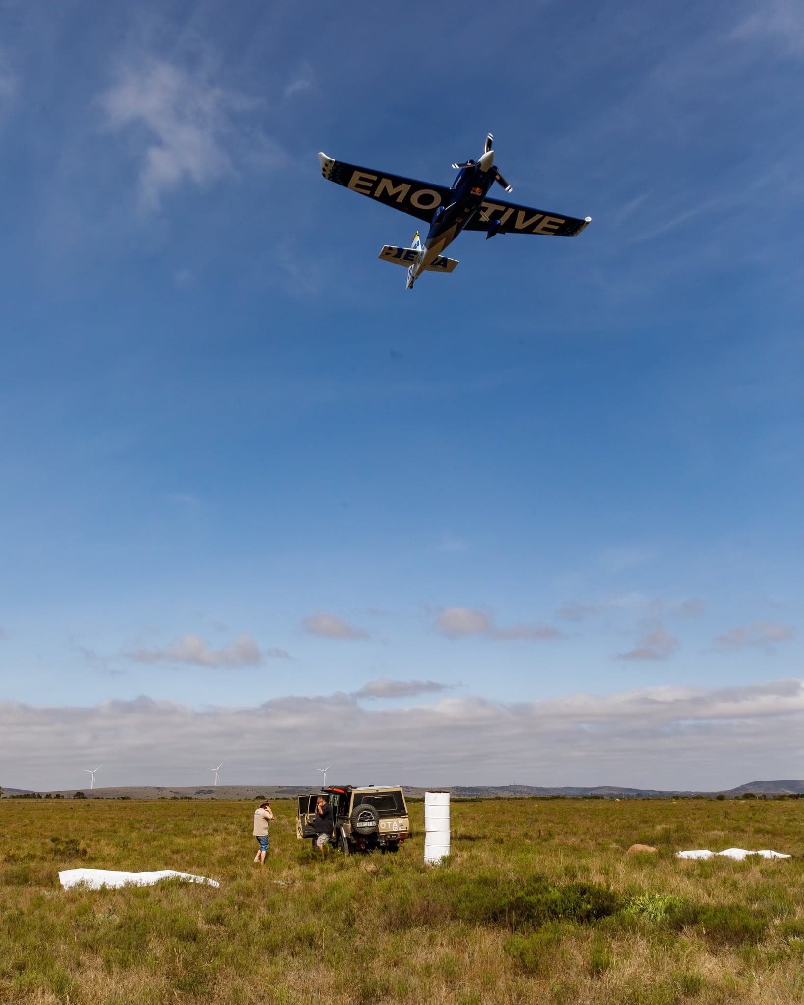 Aircraft flying over AIR RACE X markers
